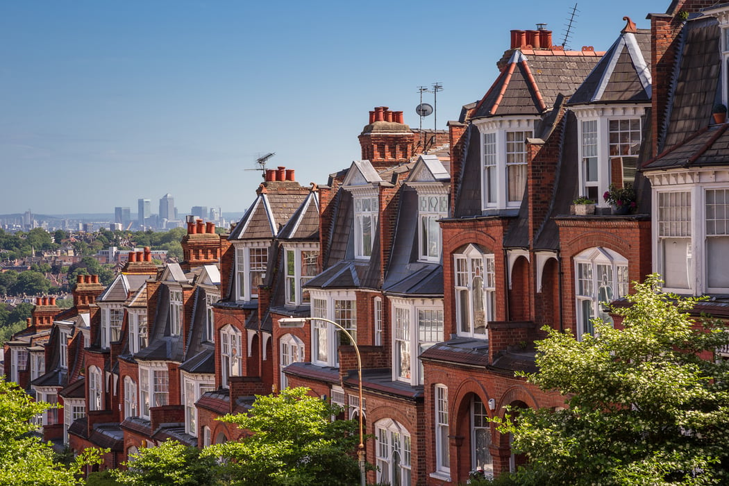 Brick houses with a view of London skyline