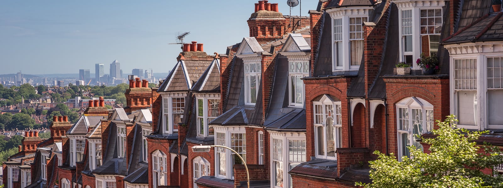 Brick houses with a view of London skyline