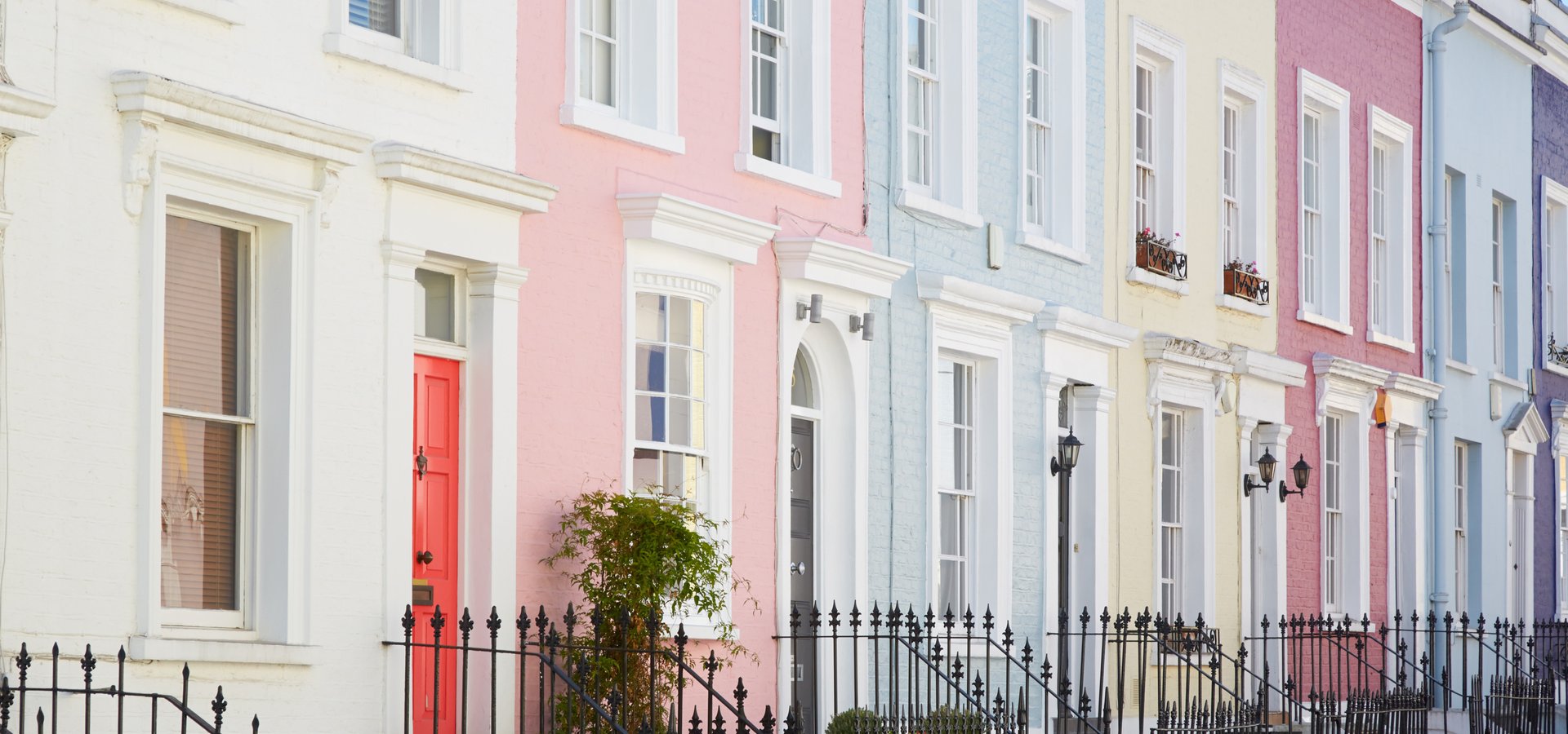 Street of colourful houses facades in London
