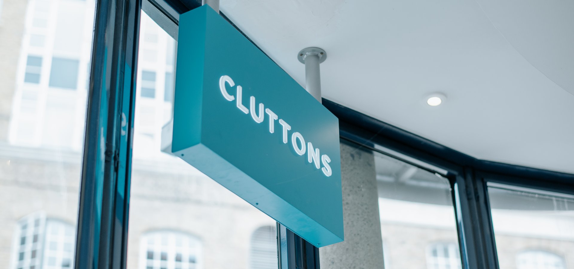 Cluttons office sign