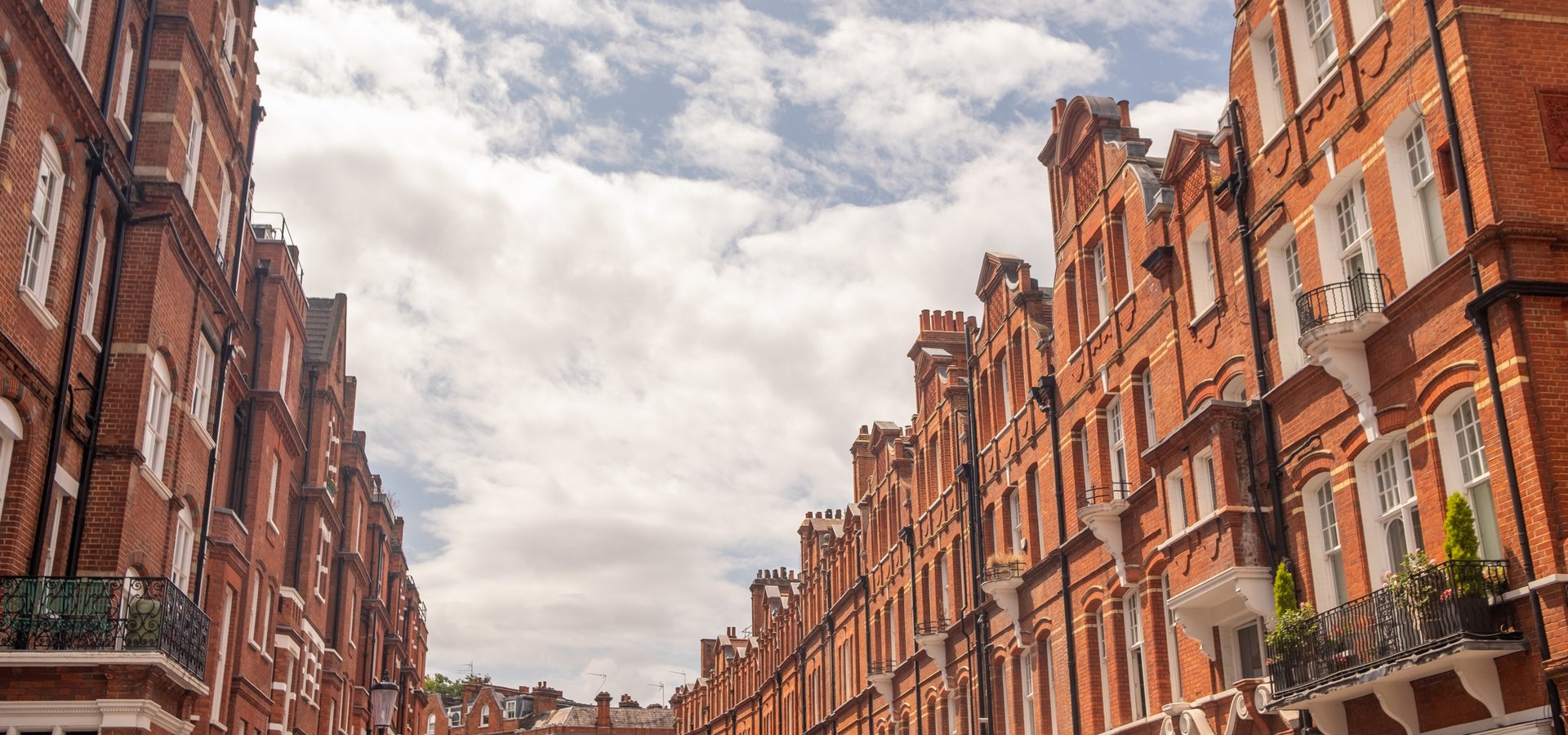 Image of red brick mansions in South Kensington, London