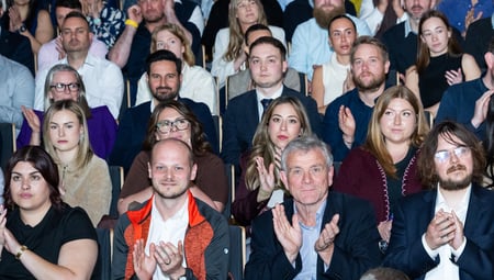 Cluttons team clapping at annual conference
