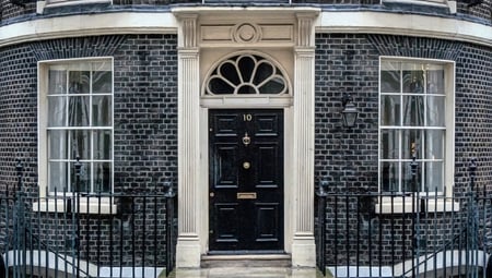 The price of policy uncertainty in the UK housing market 