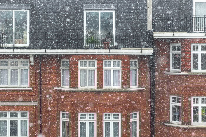 Snow falling in the front of London property