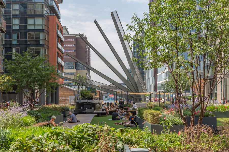 People enjoying the hottest day on record at Paddington Basin, London